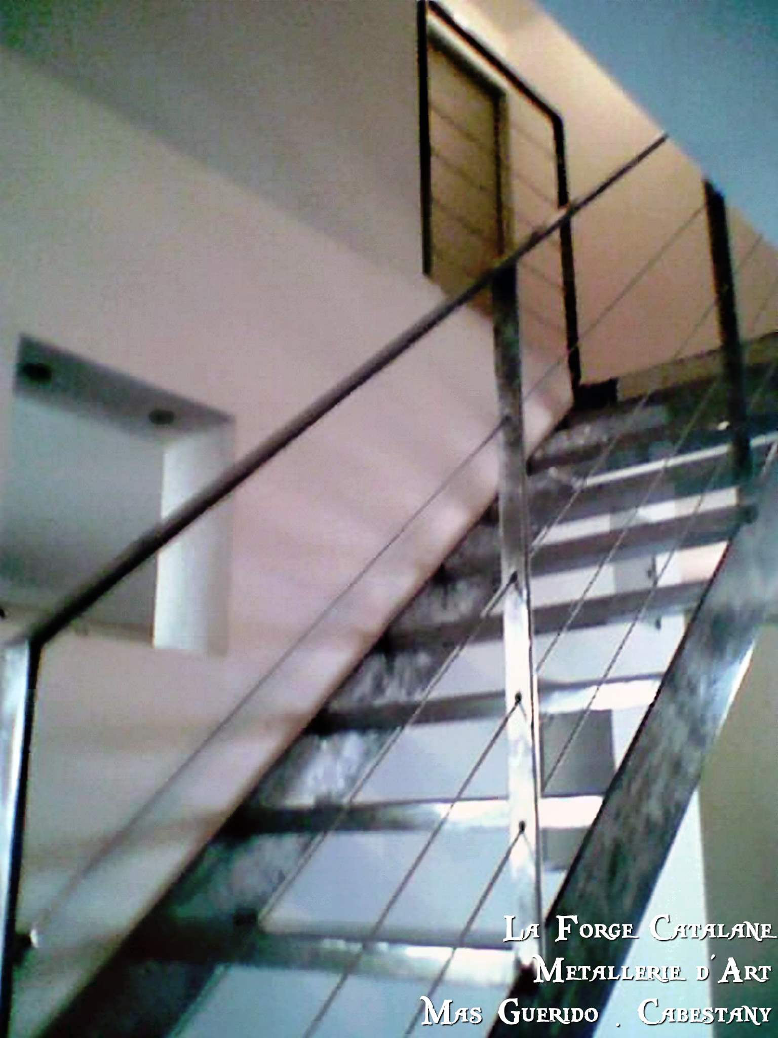 escalier double limon fer plat marches forge catalane.jpg